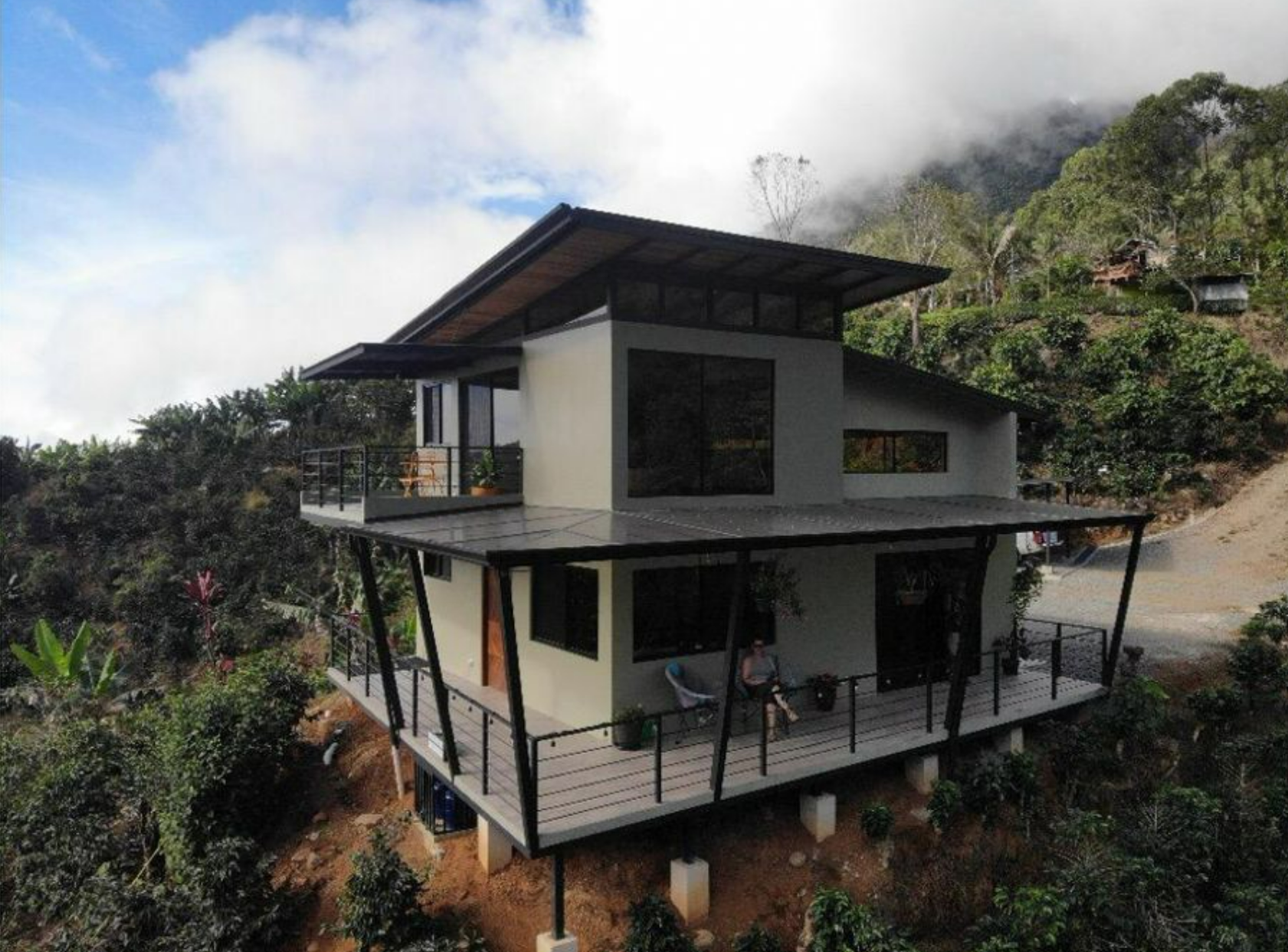 MODERN COUNTRY HOUSE WITH GUEST COTTAGE AMIDST A COFFEE PLANTATION