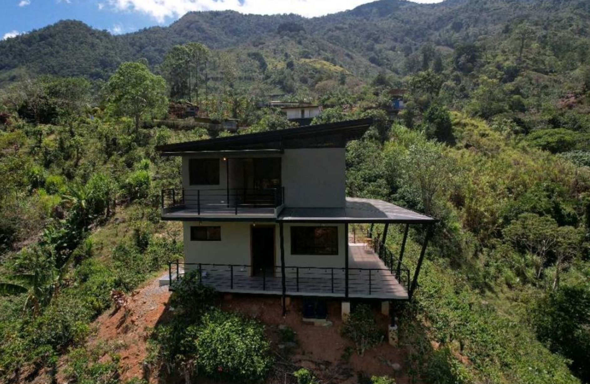 MODERN COUNTRY HOUSE WITH GUEST COTTAGE AMIDST A COFFEE PLANTATION