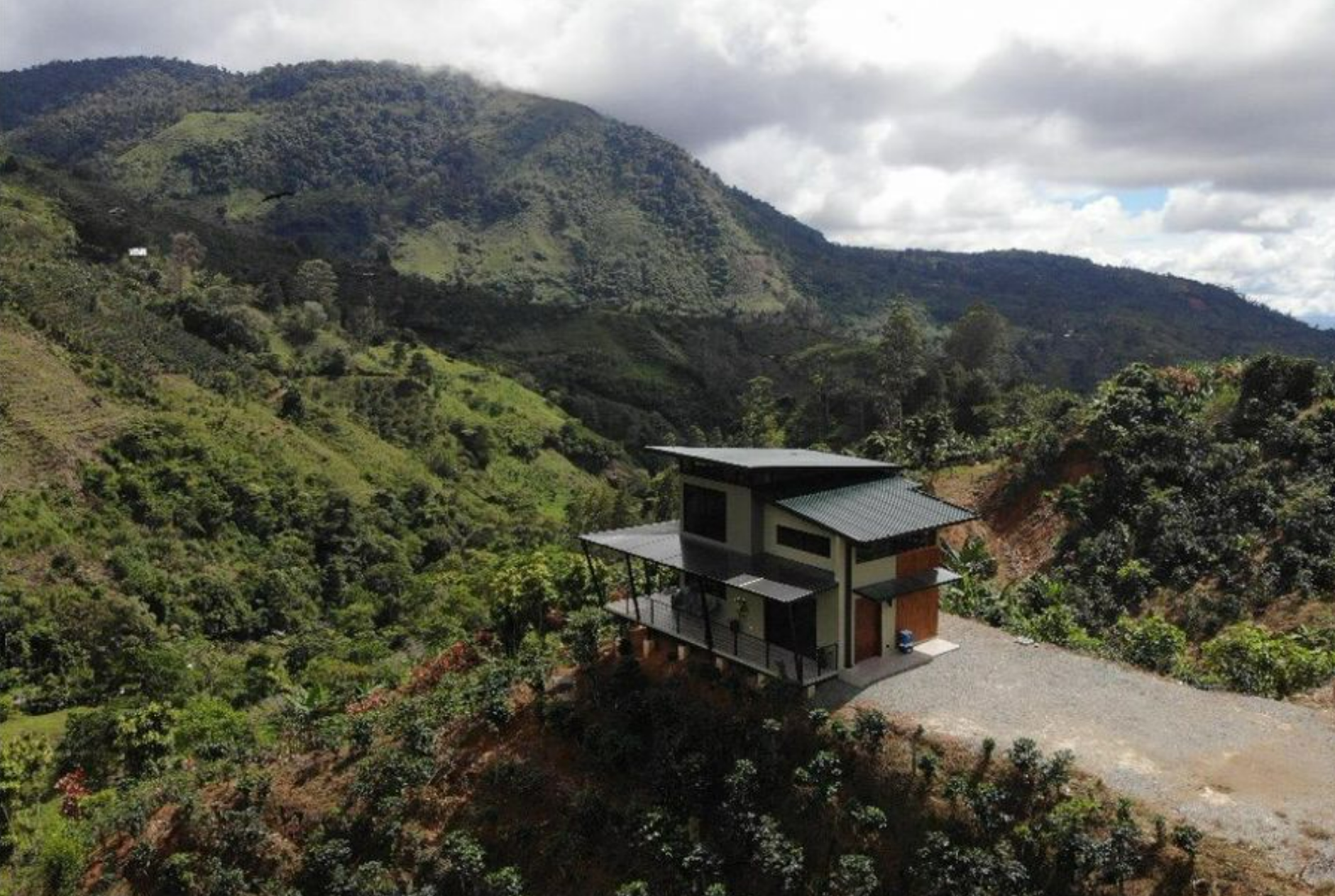 MODERN COUNTRY HOUSE WITH GUEST COTTAGE AMIDST A COFFEE PLANTATION