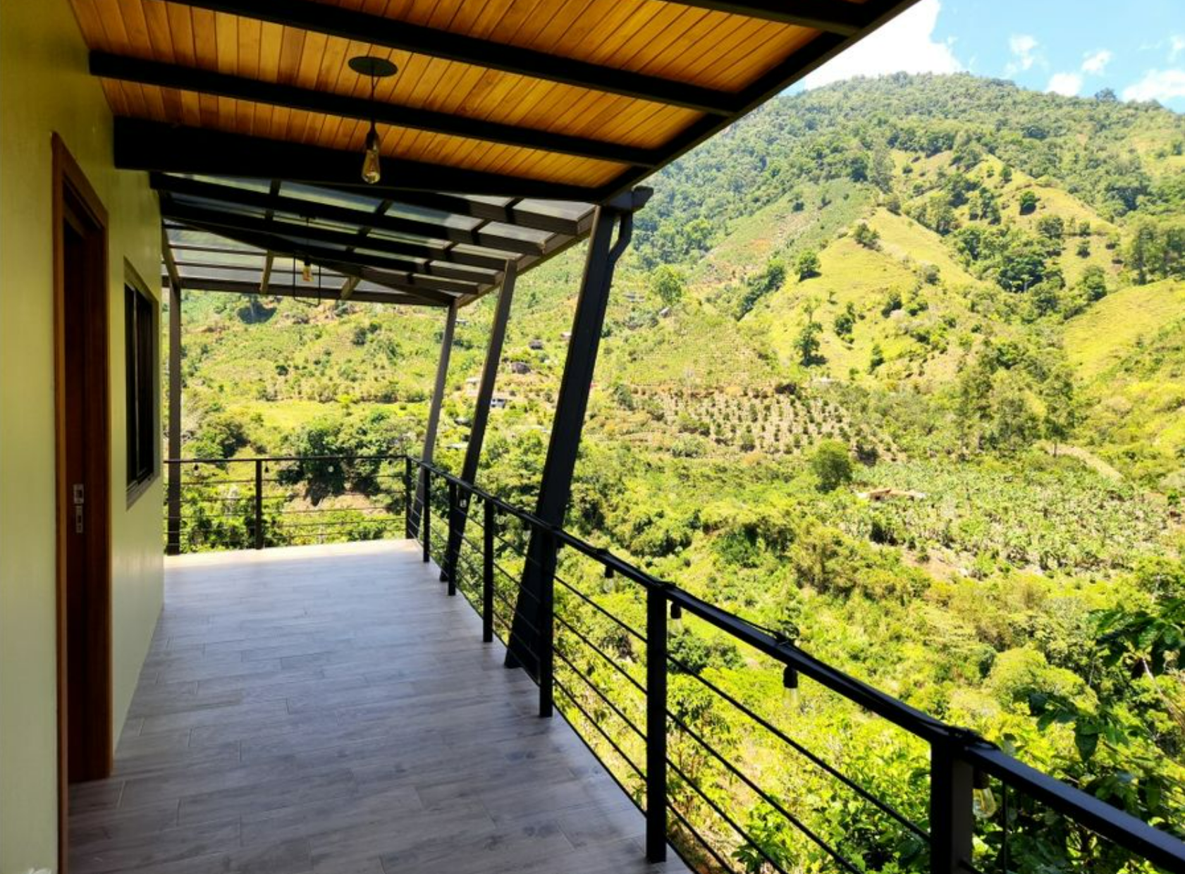 MODERN COUNTRY HOUSE WITH GUEST COTTAGE AMIDST A COFFEE PLANTATION