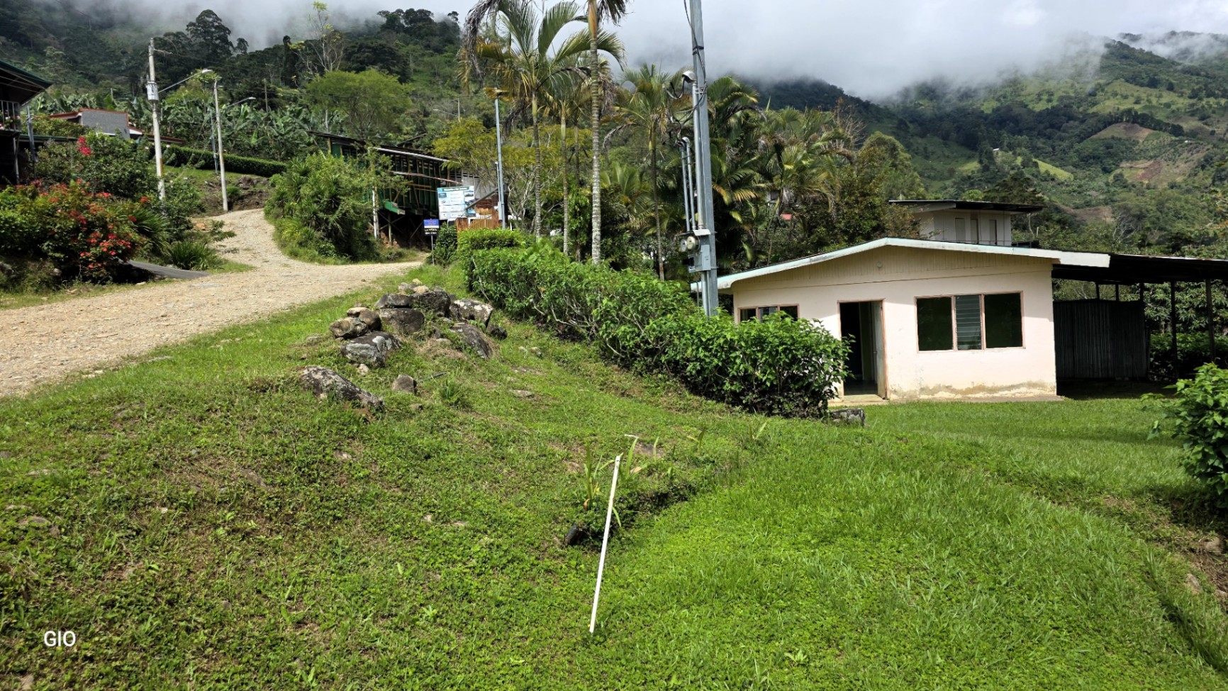 MODERN COUNTRY HOUSE WITH GUEST COTTAGE AMIDST A COFFEE PLANTATION